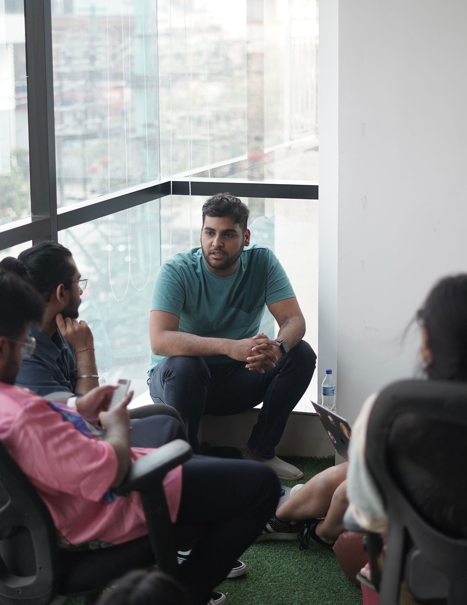 Adesh mentoring a group of designers